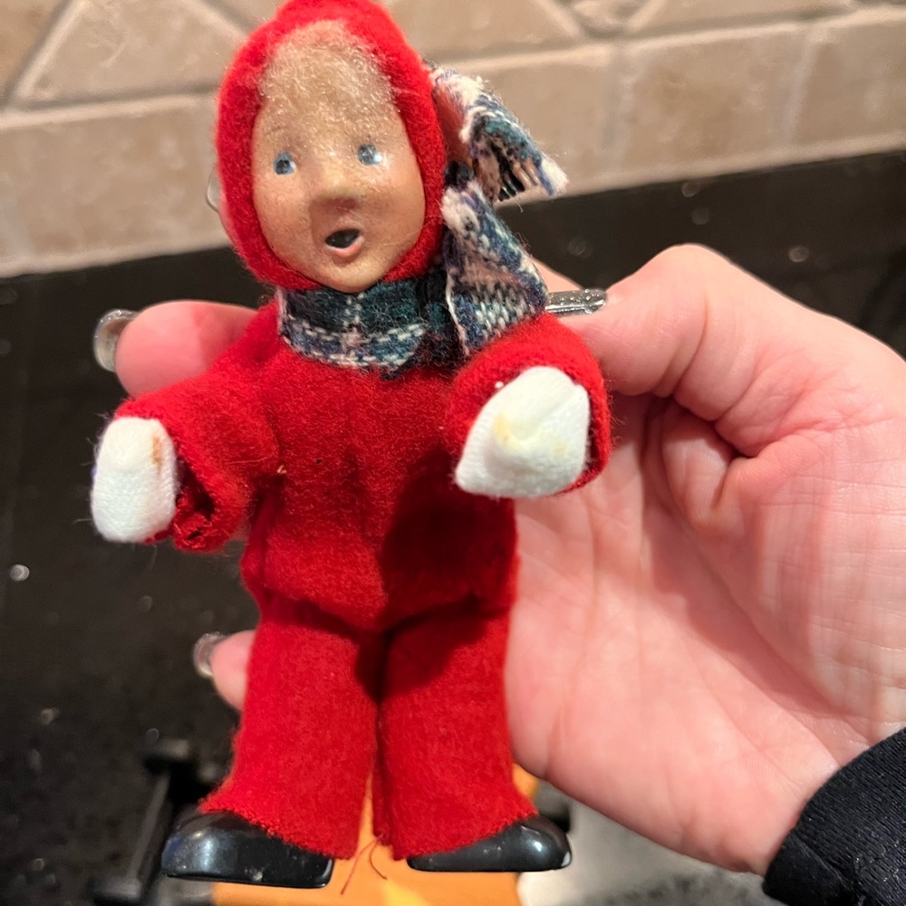 Vintage Buyers choice Caroler, boy on sled.